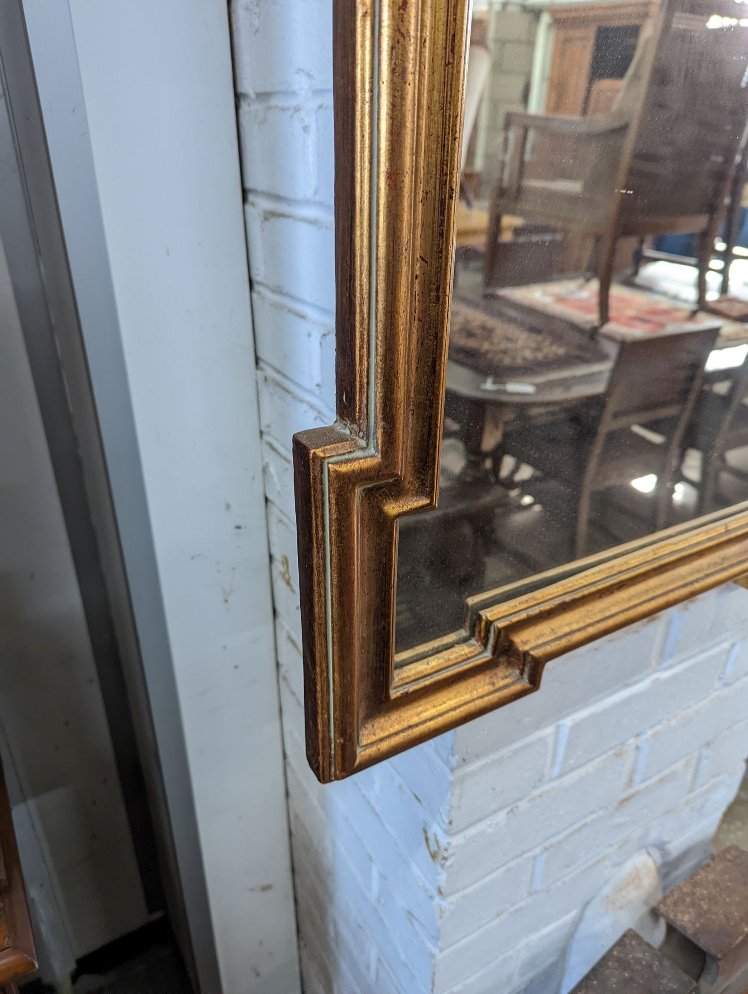 An 18th century style gilt framed wall mirror, width 59cm, height 102cm